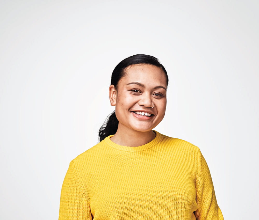 Woman in yellow sweater