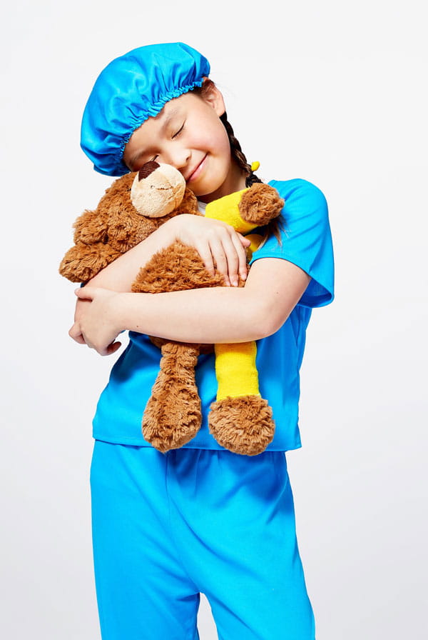 Starship kid hugging teddy bear