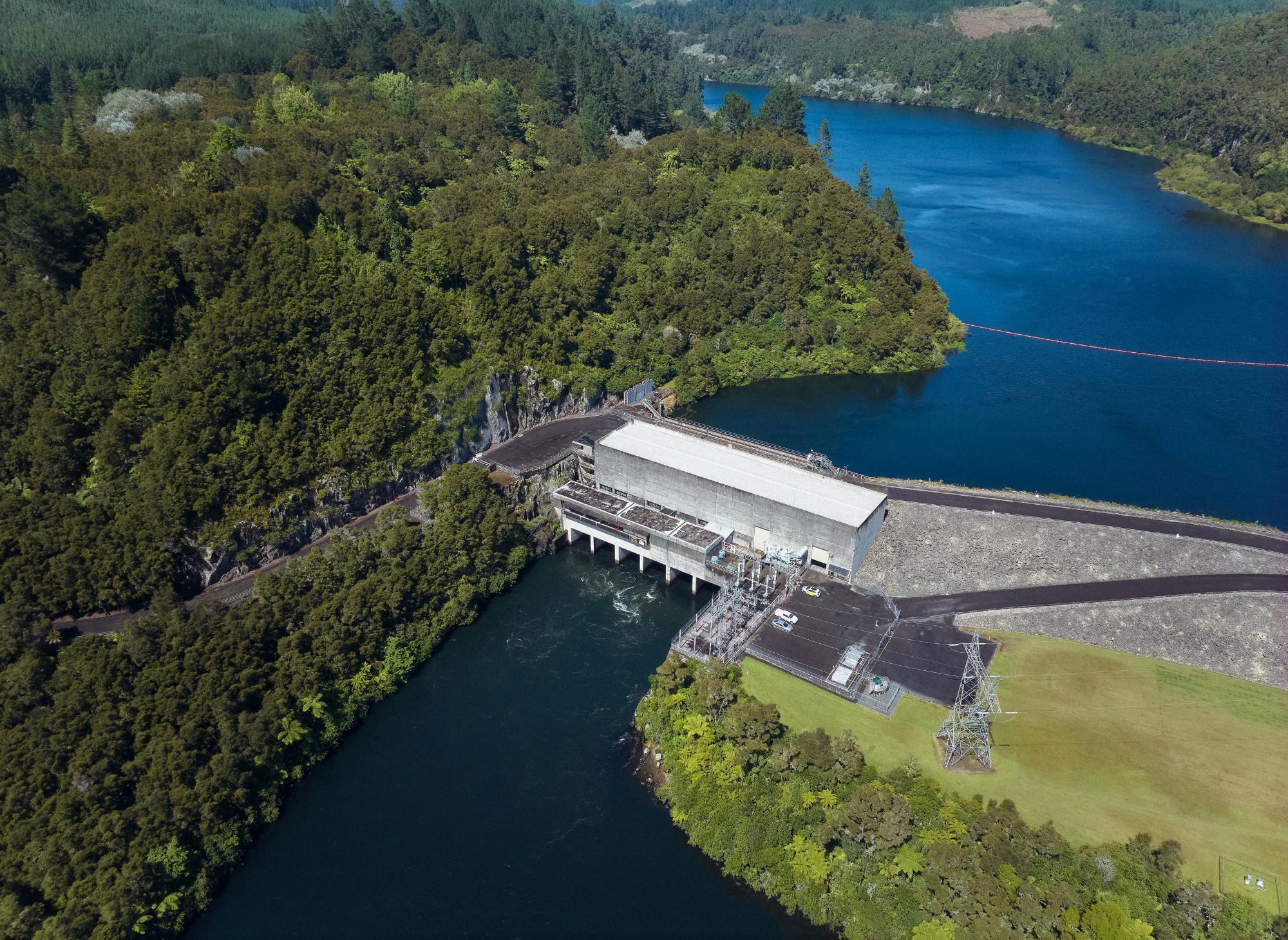 aerial photograph of Waipapa Hydro Power station and dam with the lake in the background