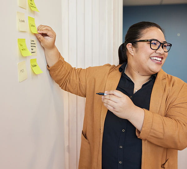 Women leading a meeting.