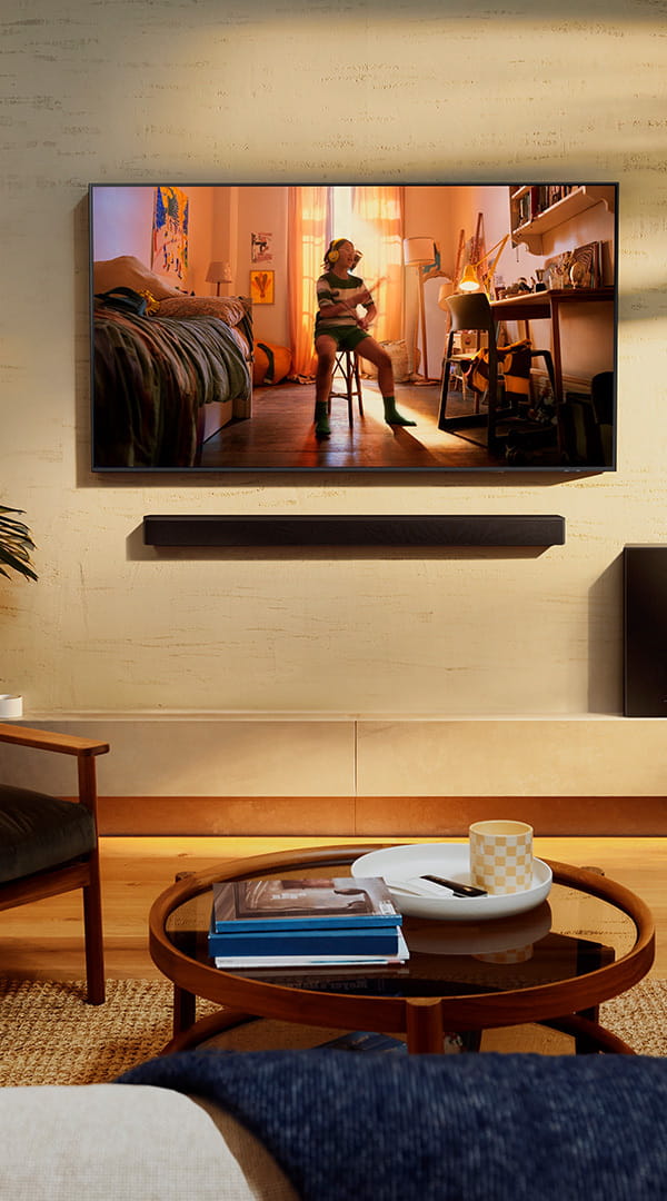 Stylish living room with a Samsung TV and Subwoofer mounted on the wall