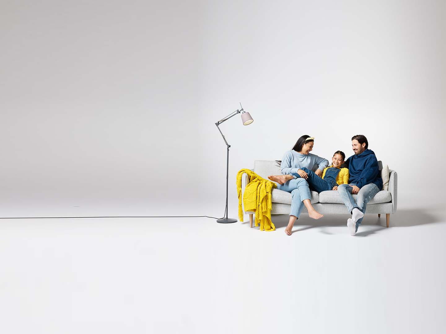 Studio-life-at-home-man-woman-child-relaxing