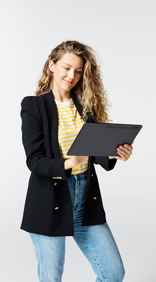 Business woman looking at tablet