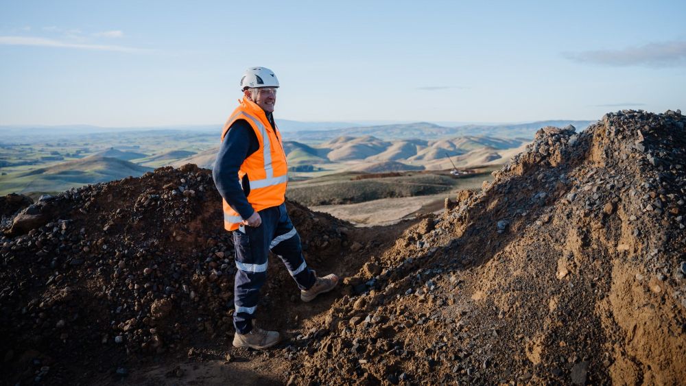 Stu Davie stood on a pile of rubble overlooking view of Kaiwera Downs site