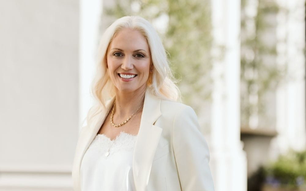 Suraiya Phillimore-Smith wearing cream jacket