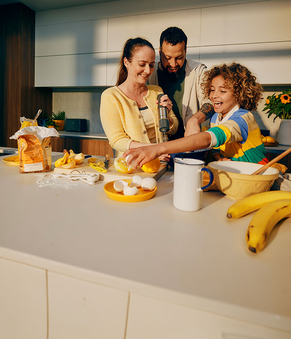 Family cooking breakfest altogether.