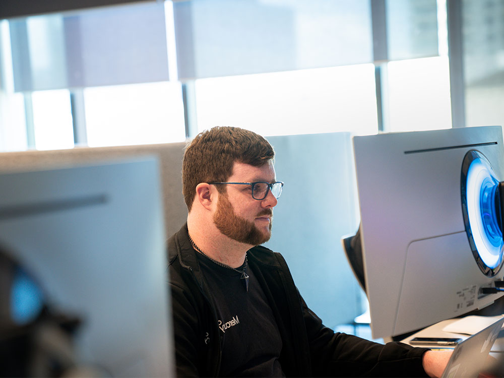 Man at network operations centre.