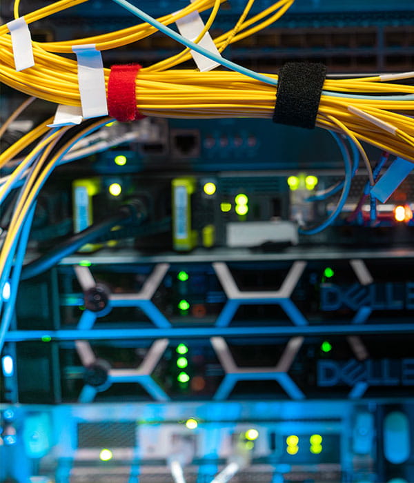 Yellow cords in a data centre.