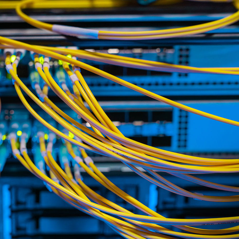 Yellow cords in a data centre. 